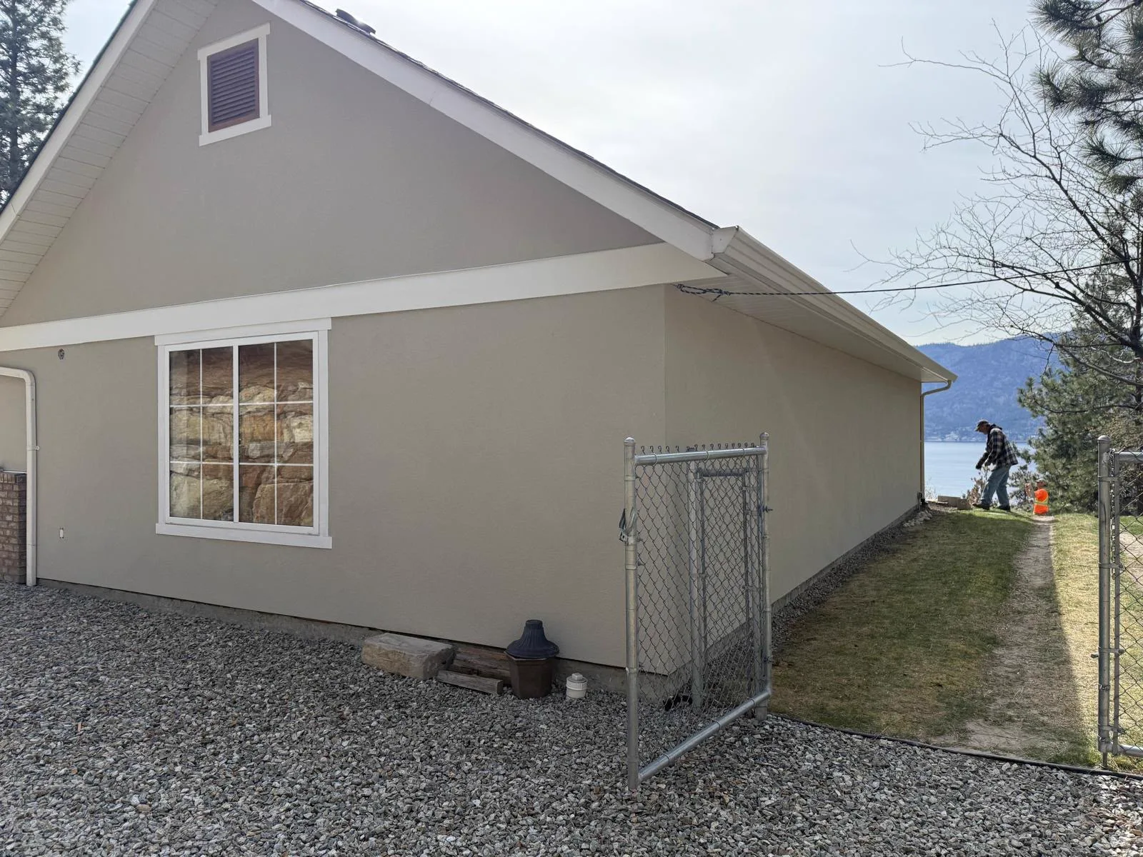 Stucco wall and gable detail at the Carrs Landing home.