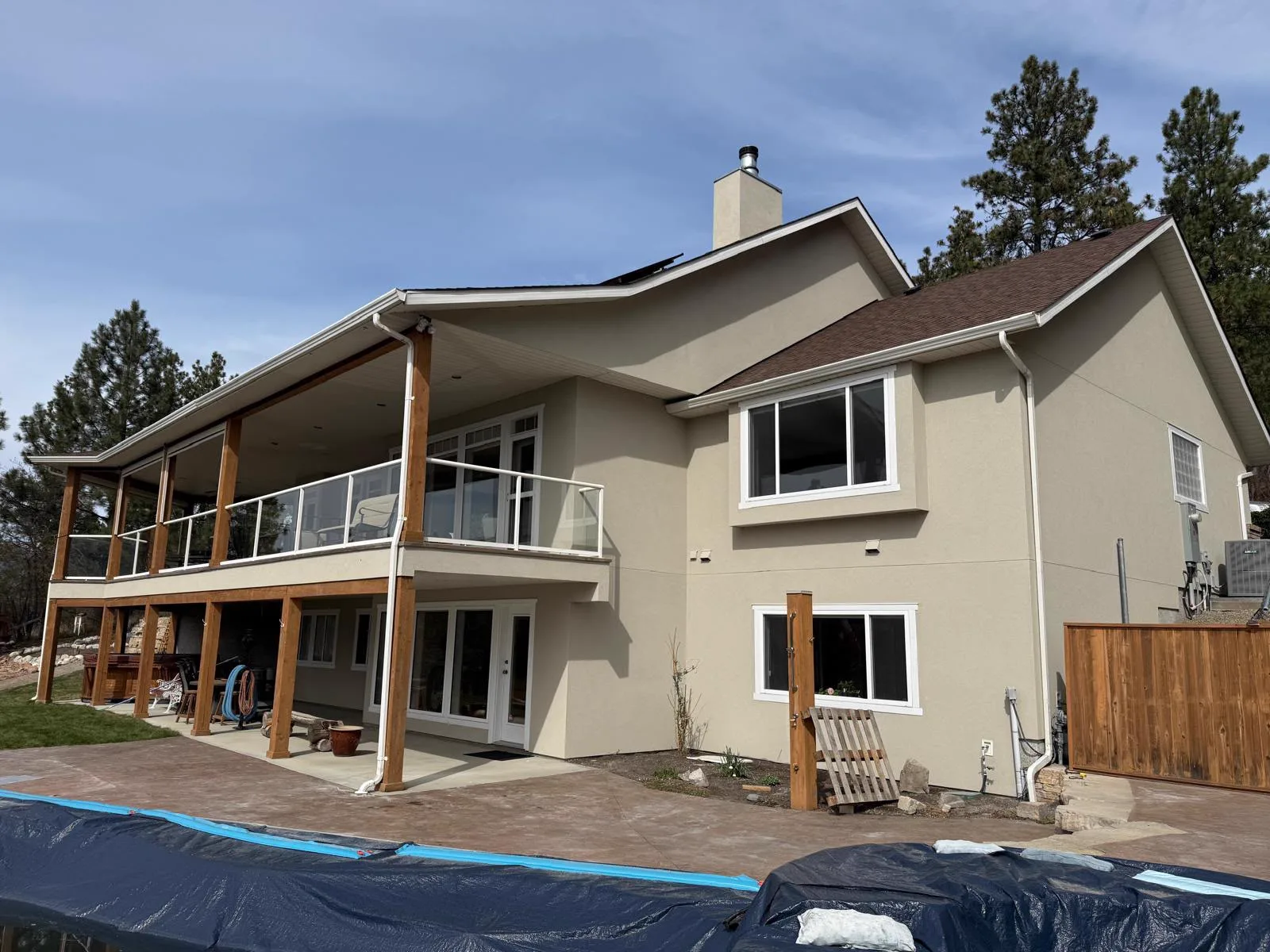 The Carrs Landing home after its vinyl siding was replaced with a full stucco exterior.
